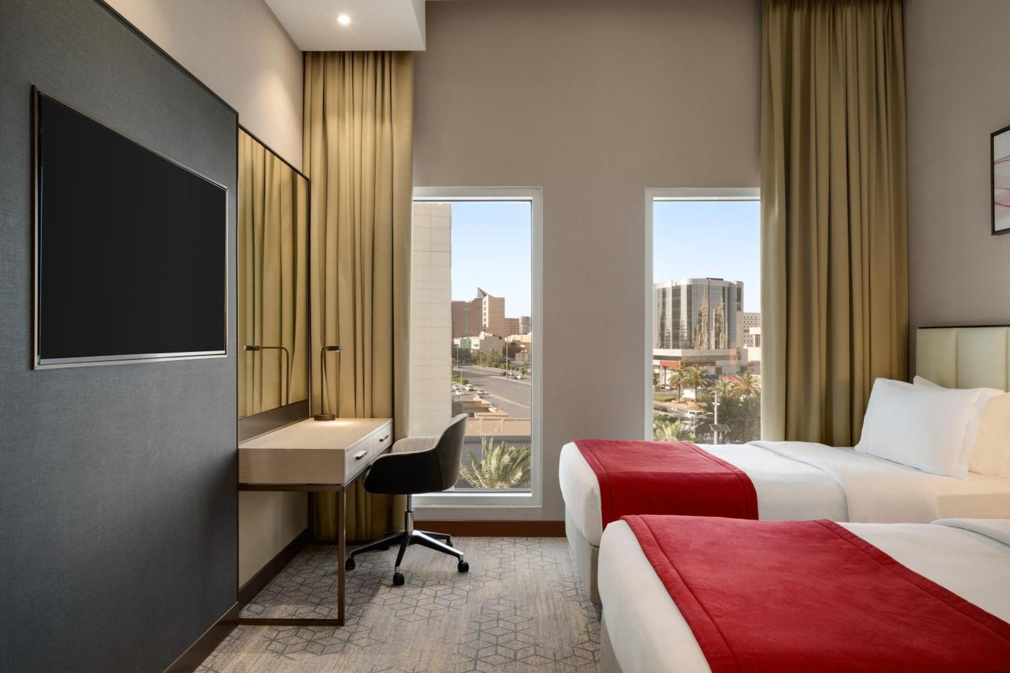 Ramada By Wyndham Riyadh King Fahd Road Exterior foto A guest room at the Hilton Las Vegas